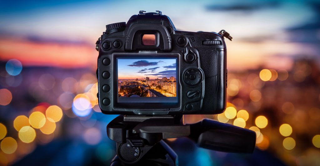 Camera pointing at sunset skyline, example of digital photography